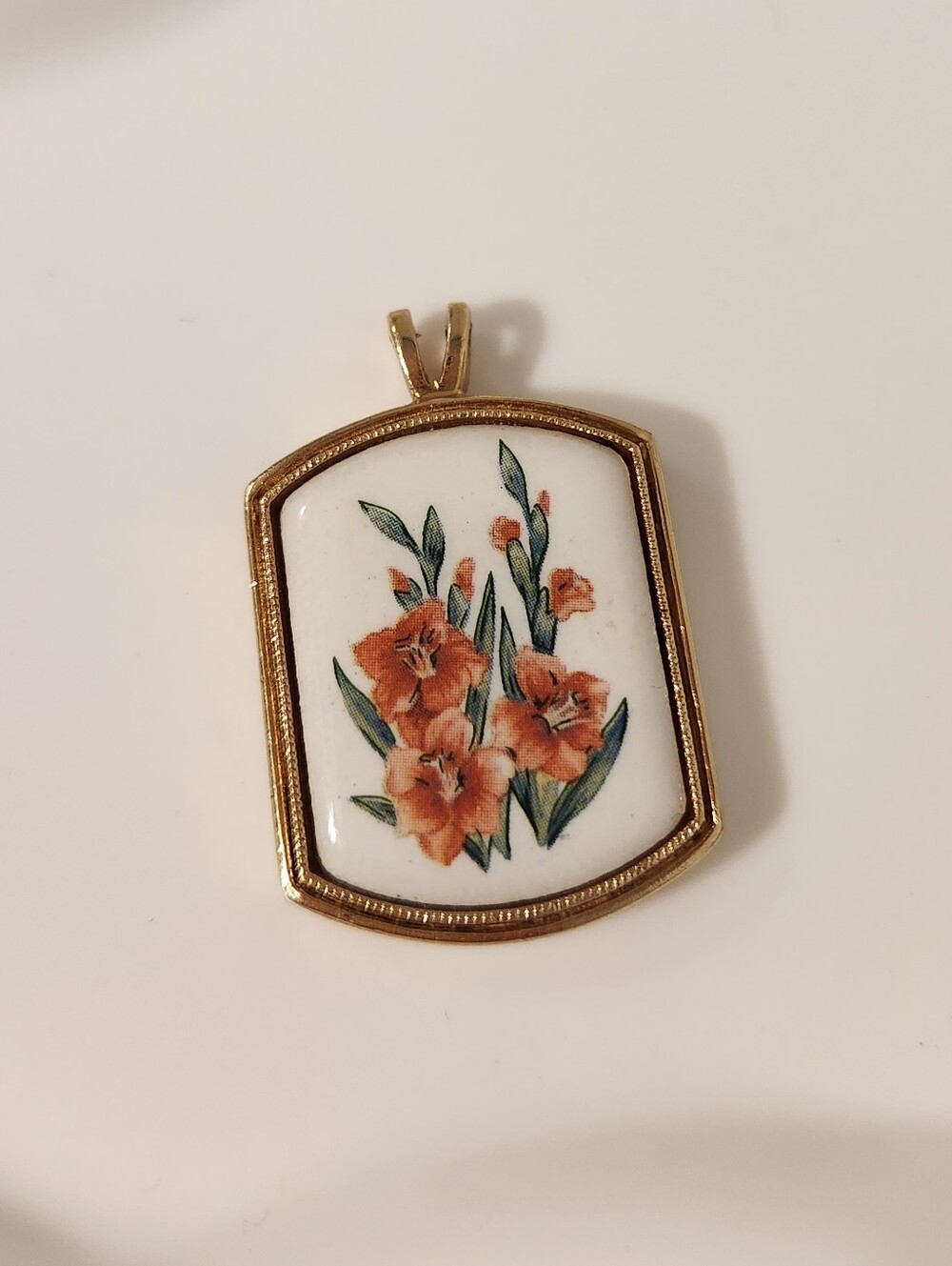Vintage Avon Gold-Tone Porcelain Pendant For Necklace with Orange Floral Motif